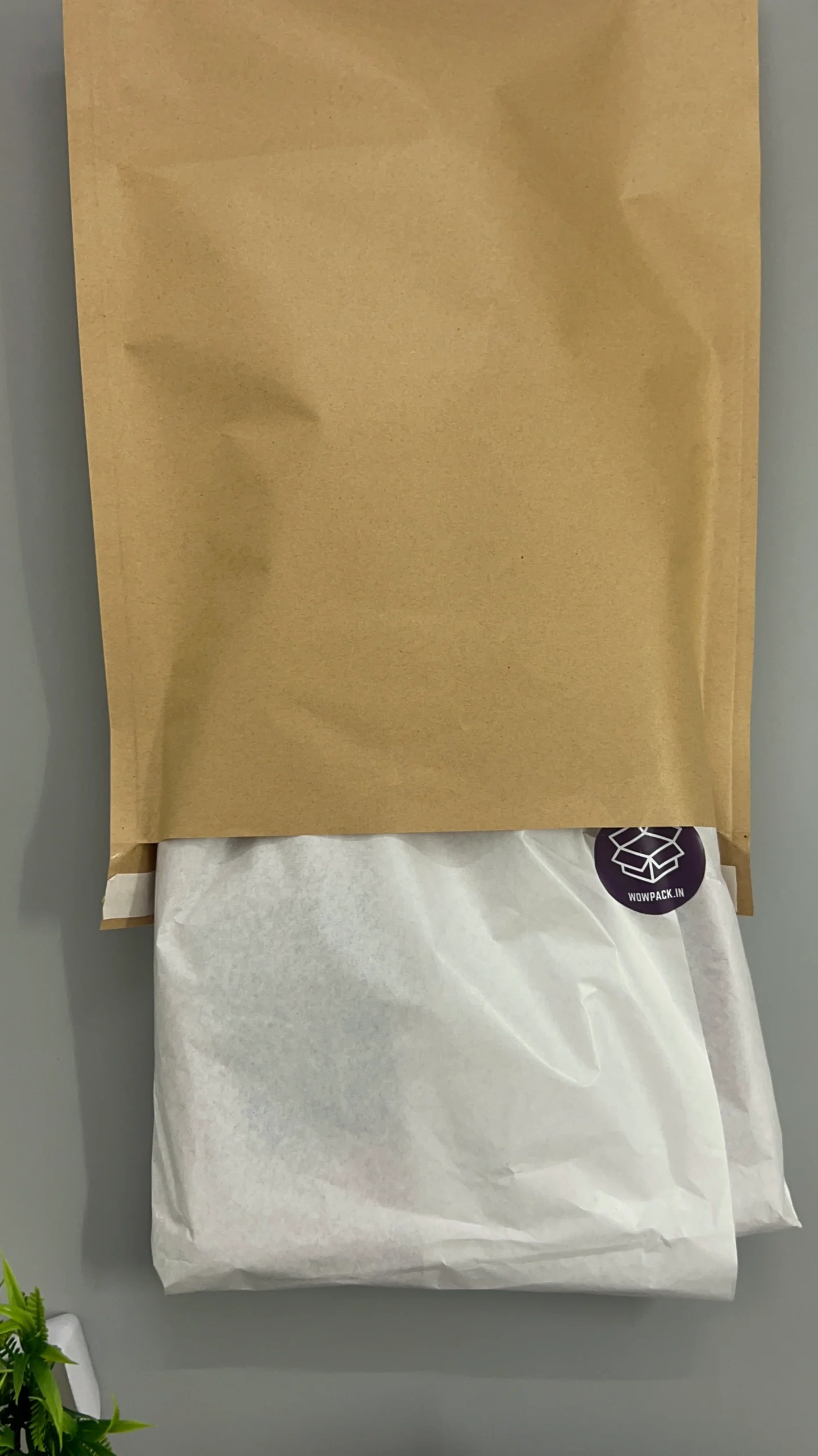 Plain wrapping paper sheets used for packaging products safely and neatly, ideal for e-commerce, gifting, and shipping.